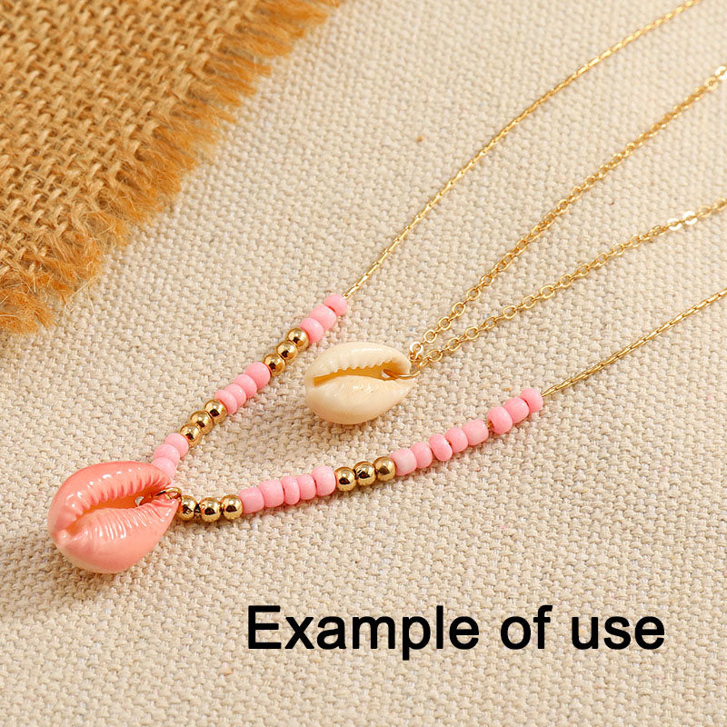 110g One Jar of Gold-ringer Cowrie with Hole, High-Gloss Sea Shell Natural Beach Shell for DIY Phone Case Phone Chain Jewelry Crafts Supplies, Beach Wedding Decor, Fish Tank & Aquarium Decoration