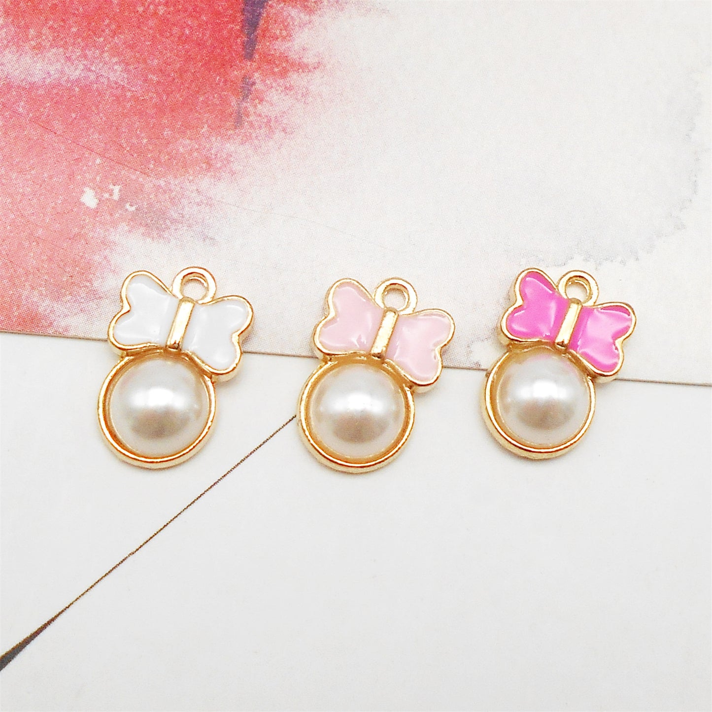 20PCS 15*10mm Enamel Bow Charms with Imitation Pearl Alloy Bowknot Pendants Cute Jewelry Accessories for Necklace Bracelet Earring Making Keychain Bags Decor Craft Decoration
