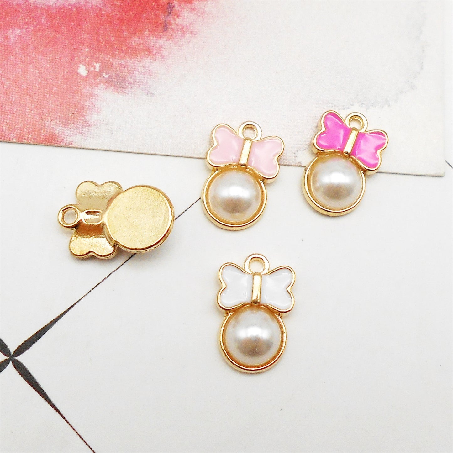 20PCS 15*10mm Enamel Bow Charms with Imitation Pearl Alloy Bowknot Pendants Cute Jewelry Accessories for Necklace Bracelet Earring Making Keychain Bags Decor Craft Decoration